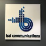 BAI Communications' logo inside the Toronto-based office.